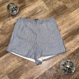 Rare Charlotte Russe light blue pinstripe shorts with zipper on the side.